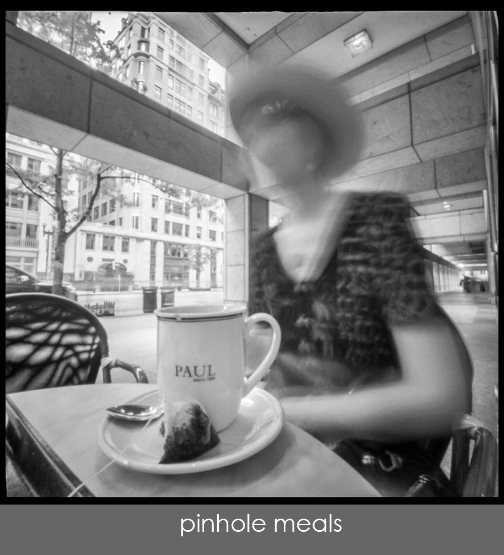 Pinhole photo of Nancy having tea. Click here to enter the Squaremeals gallery.