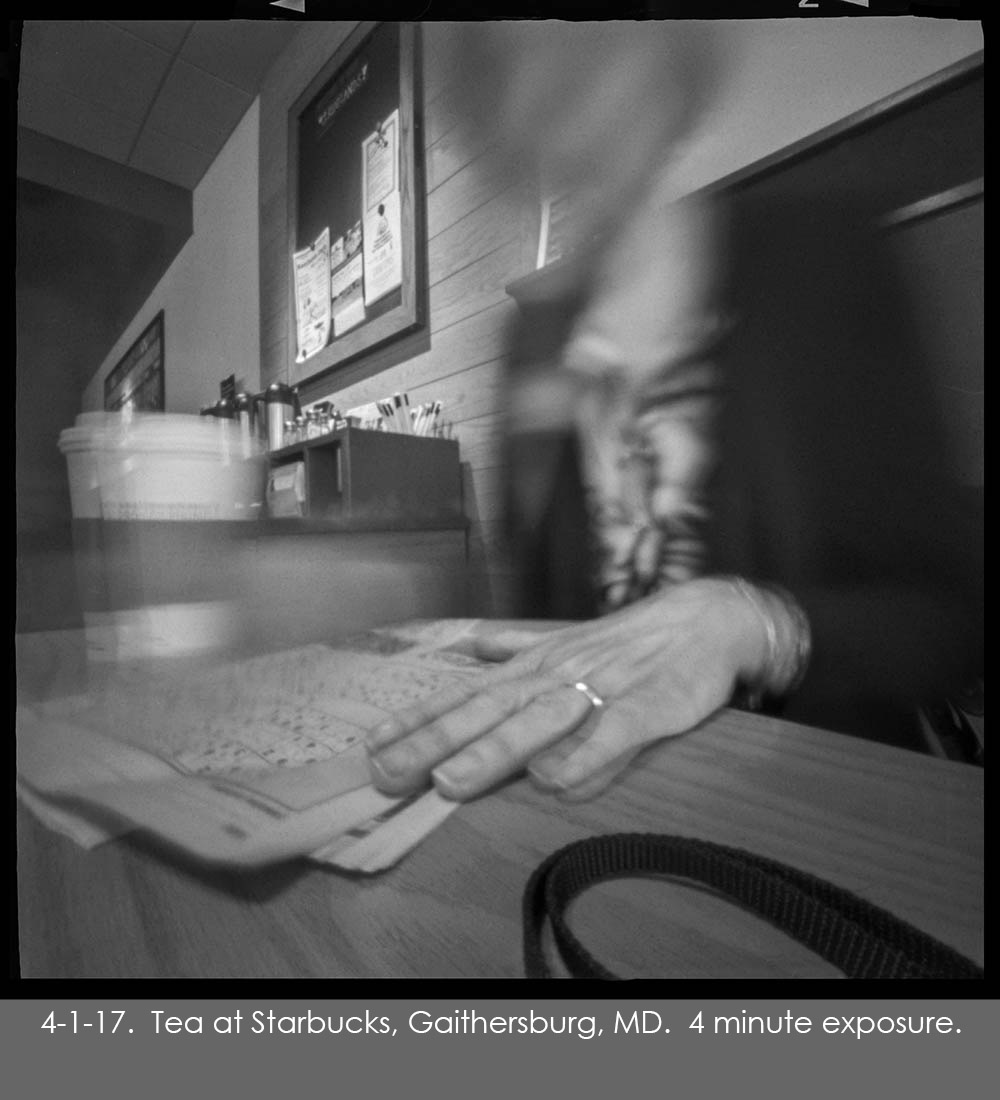 Pinhole photo of Nancy having tea at Starbucks in Gaithersburg, MD.