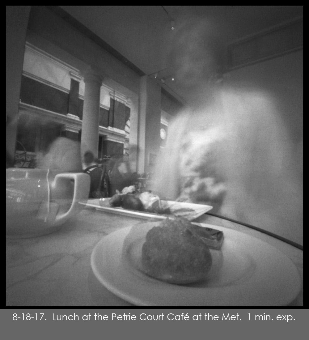Pinhole photo of Nancy having lunch at the Metropolitan Museum of Art in NYC.